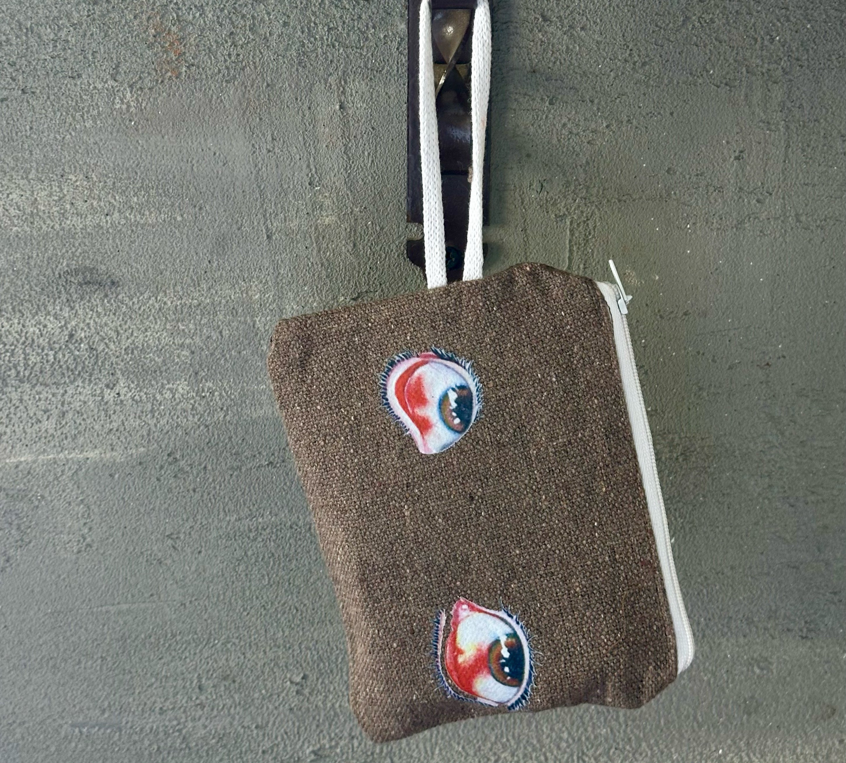 tired eyes - coin pouch