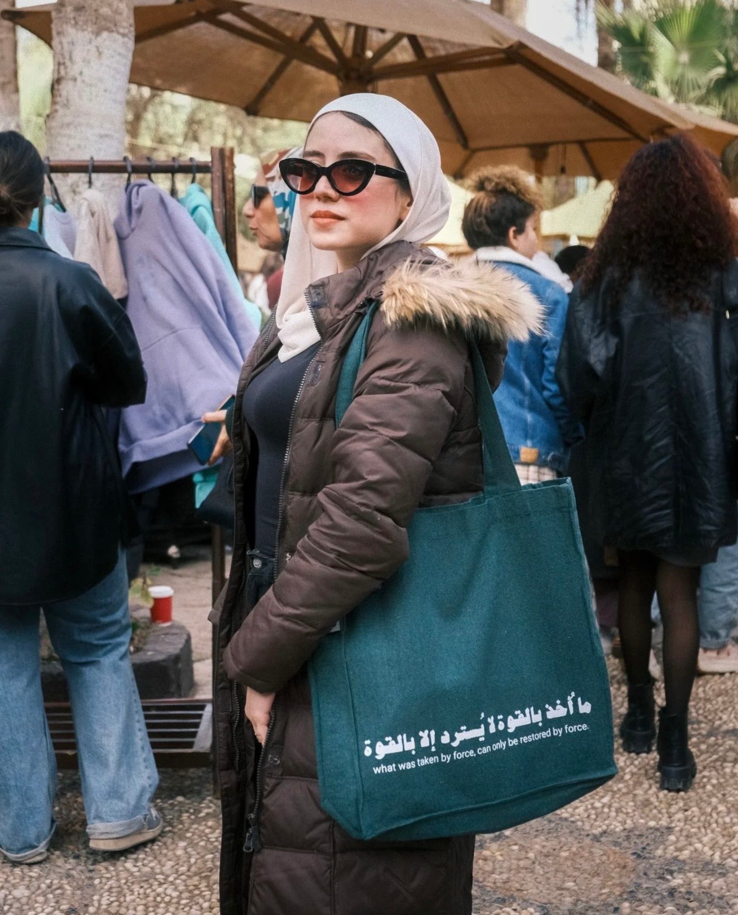 ما اخذ بالقوة- large tote bag