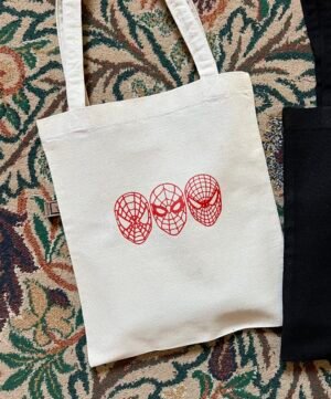 spider man • marvel- medium off white tote bag