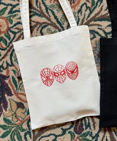 spider man • marvel- medium off white tote bag