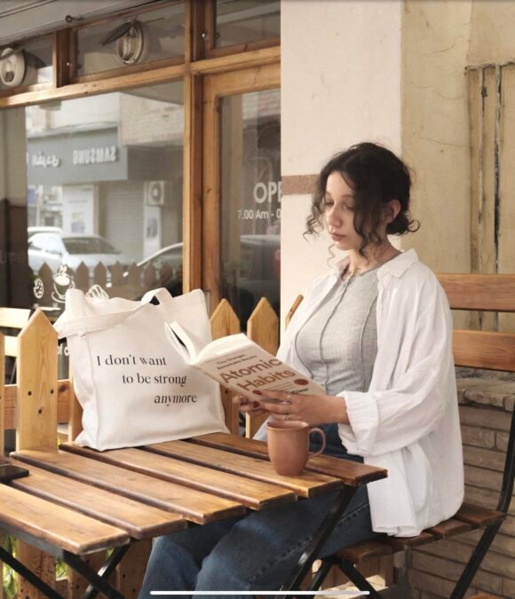 no strong women anymore - large off white tote bag