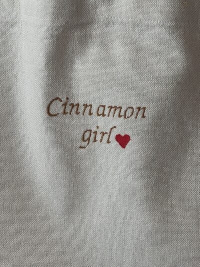 Cinnamon girl- large off white tote bag