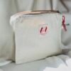 0E126764-17AE-454E-8A5E-625215781D26 Ivory Pouch