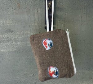 tired eyes - brown Coin Pouch